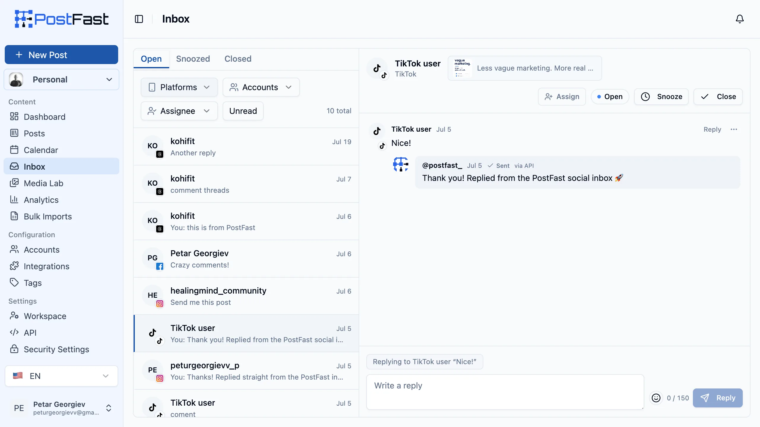 The PostFast Social Inbox: a list of comment conversations on the left with unread counts and platform badges, the selected thread in the middle with a reply composer and character counter, and conversation status and assignment controls on the right